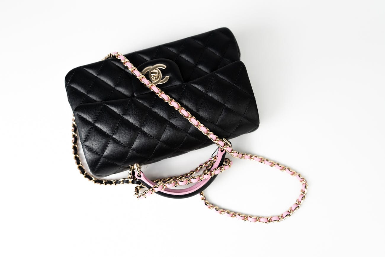 CHANEL Handbag 23P Mini Top Handle Black/Pink Lambskin Quilted w/ Light Gold Hardware - Redeluxe