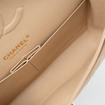 CHANEL Handbag Beige Clair Caviar Quilted Classic Double Flap Medium Gold Hardware - Redeluxe