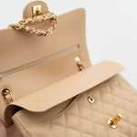 CHANEL Handbag Beige Clair Caviar Quilted Classic Double Flap Medium Gold Hardware - Redeluxe