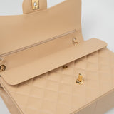 CHANEL Handbag Beige Clair Caviar Quilted Classic Flap Jumbo GHW - Redeluxe