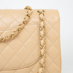 CHANEL Handbag Beige Clair Caviar Quilted Classic Flap Medium Gold Hardware - Redeluxe