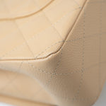 CHANEL Handbag Beige Clair Caviar Quilted Classic Flap Medium Gold Hardware - Redeluxe