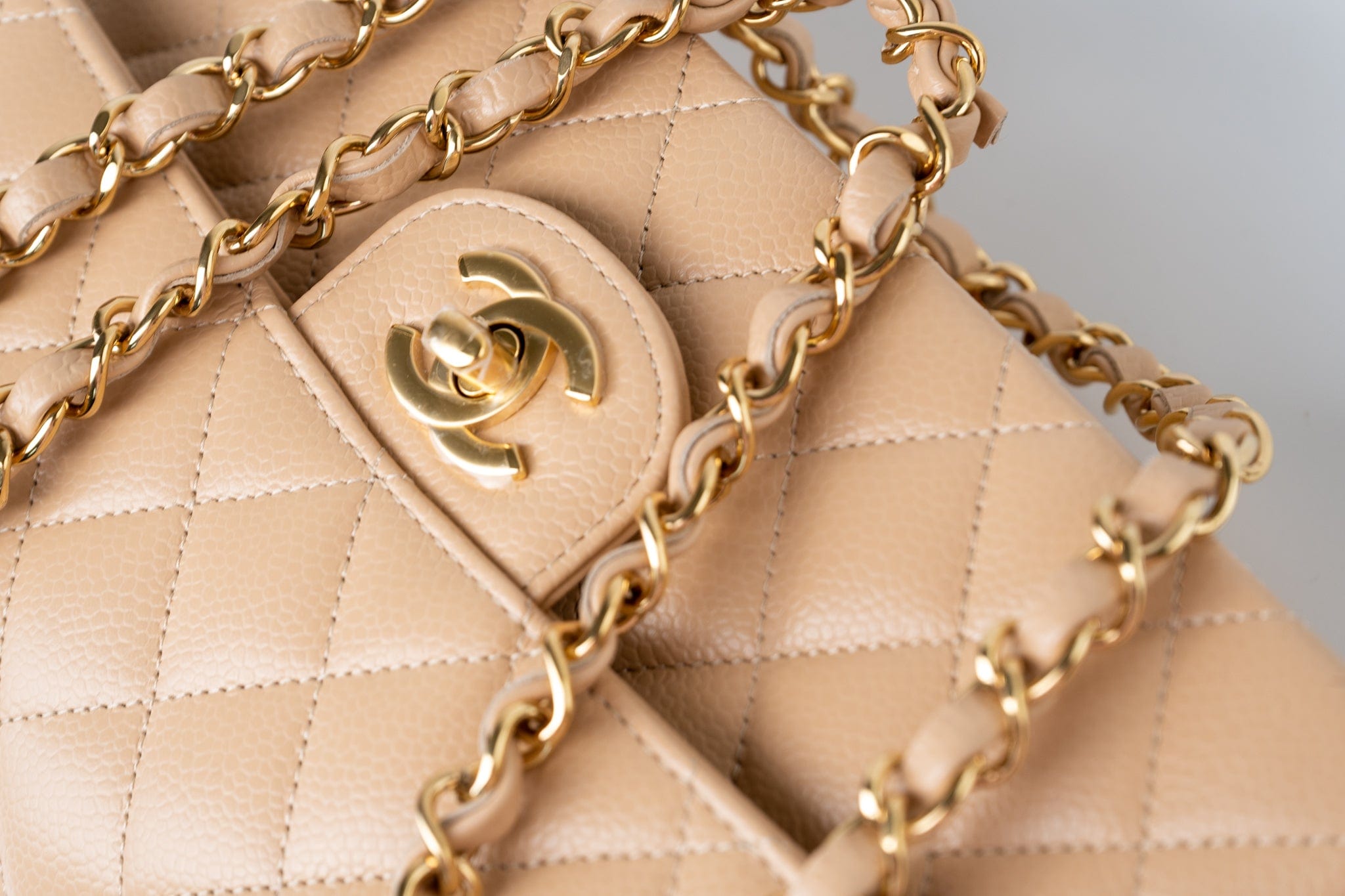 CHANEL Handbag Beige Clair Caviar Quilted Classic Flap Small Gold Hardware - Redeluxe