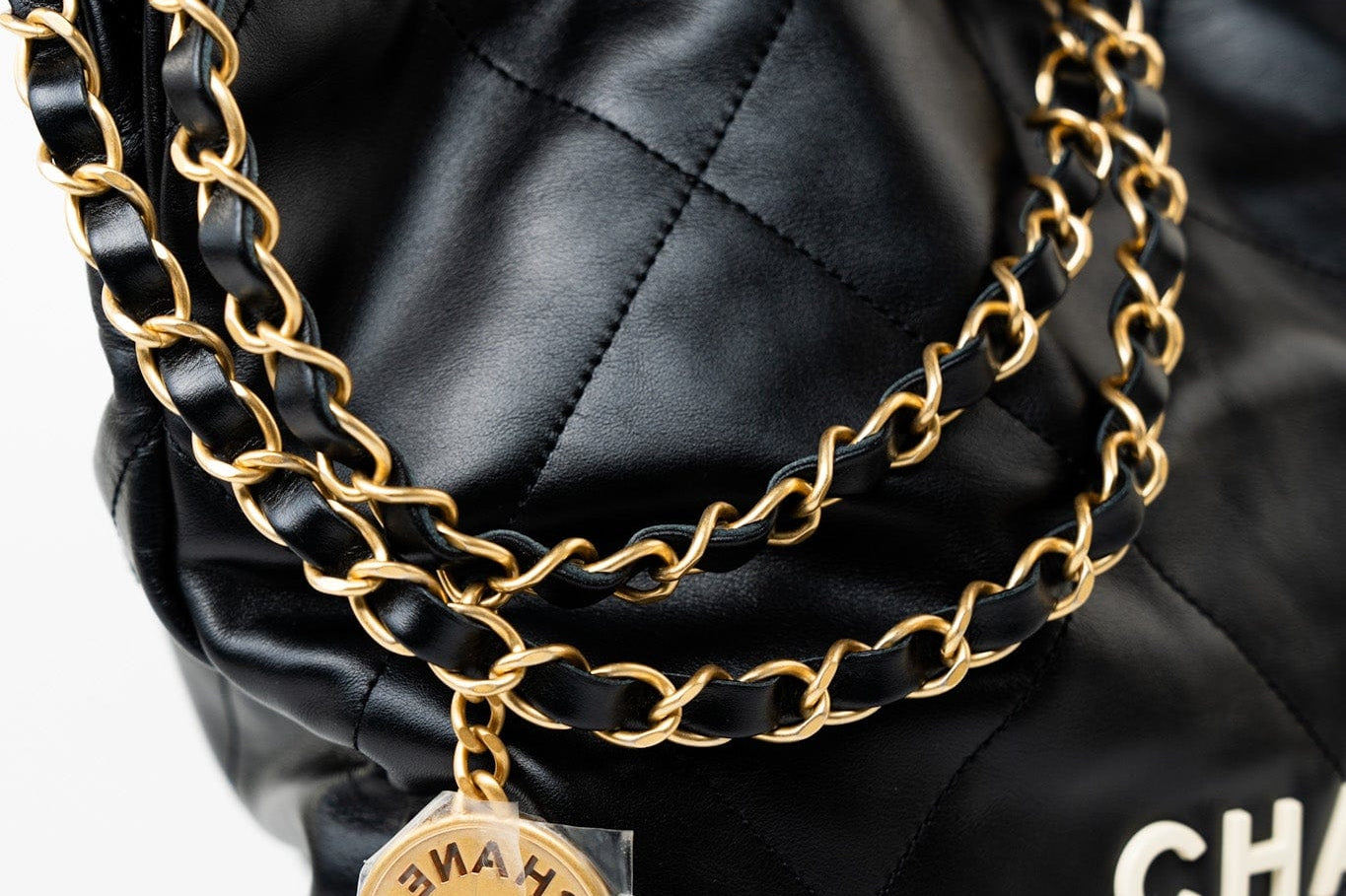 CHANEL Handbag Black 22S Black Calfskin Quilted 22 Drawstring Bag Small Antique Gold Hardware - Redeluxe