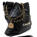 CHANEL Handbag Black 22S Black Calfskin Quilted 22 Drawstring Bag Small Antique Gold Hardware - Redeluxe