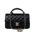 CHANEL Handbag Black 23A Black Lambskin Mini Top Handle Light Gold Hardware - Redeluxe