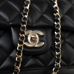 CHANEL Handbag Black 23A Black Lambskin Mini Top Handle Light Gold Hardware - Redeluxe