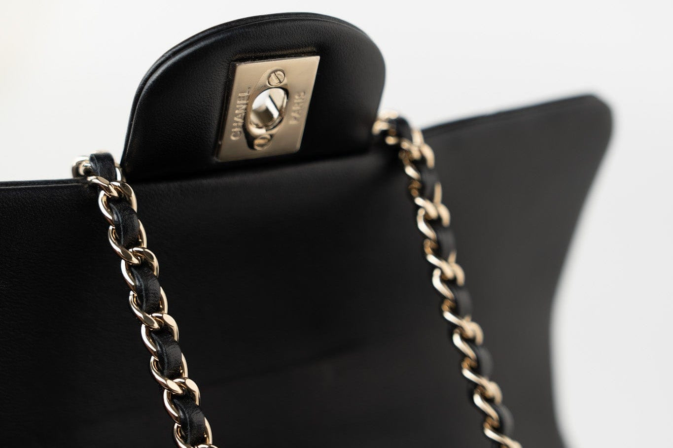 CHANEL Handbag Black 23A Black Lambskin Mini Top Handle Light Gold Hardware - Redeluxe