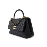 CHANEL Handbag Black Black Caviar Quilted Coco Handle Medium Antique Gold Hardware - Redeluxe