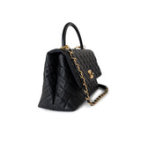 CHANEL Handbag Black Black Caviar Quilted Coco Handle Medium Antique Gold Hardware - Redeluxe