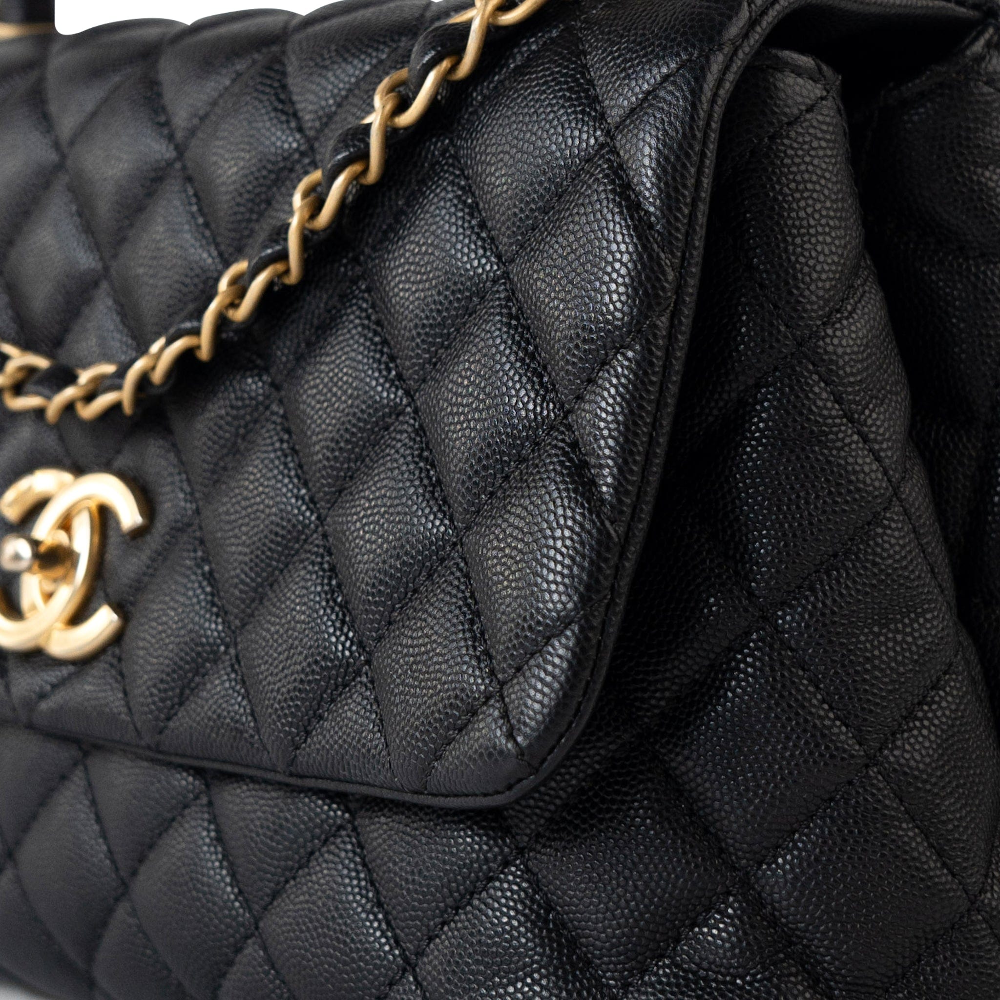 CHANEL Handbag Black Black Caviar Quilted Coco Handle Medium Antique Gold Hardware - Redeluxe