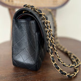 CHANEL Handbag Black Black Caviar Quilted Jumbo Classic Flap Gold Hardware - Redeluxe