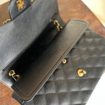 CHANEL Handbag Black Black Caviar Quilted Jumbo Classic Flap Gold Hardware - Redeluxe