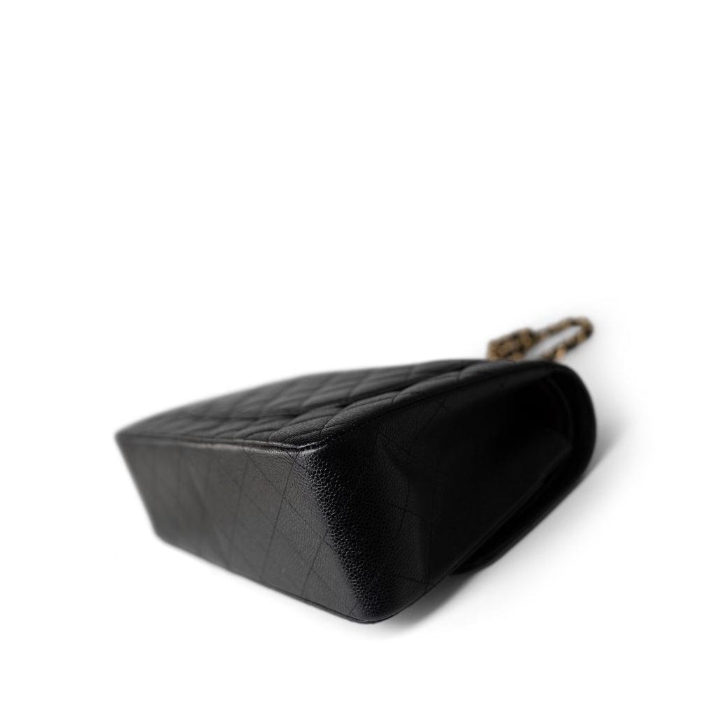 CHANEL Handbag Black Black Caviar Quilted Jumbo Classic Flap Gold Hardware - Redeluxe