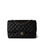 CHANEL Handbag Black Black Caviar Quilted Jumbo Classic Flap Gold Hardware - Redeluxe