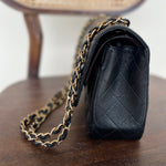 CHANEL Handbag Black Black Caviar Quilted Jumbo Classic Flap Gold Hardware - Redeluxe