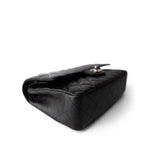 CHANEL Handbag Black Black Caviar Quilted Medium Classic Flap Silver Hardware - Redeluxe
