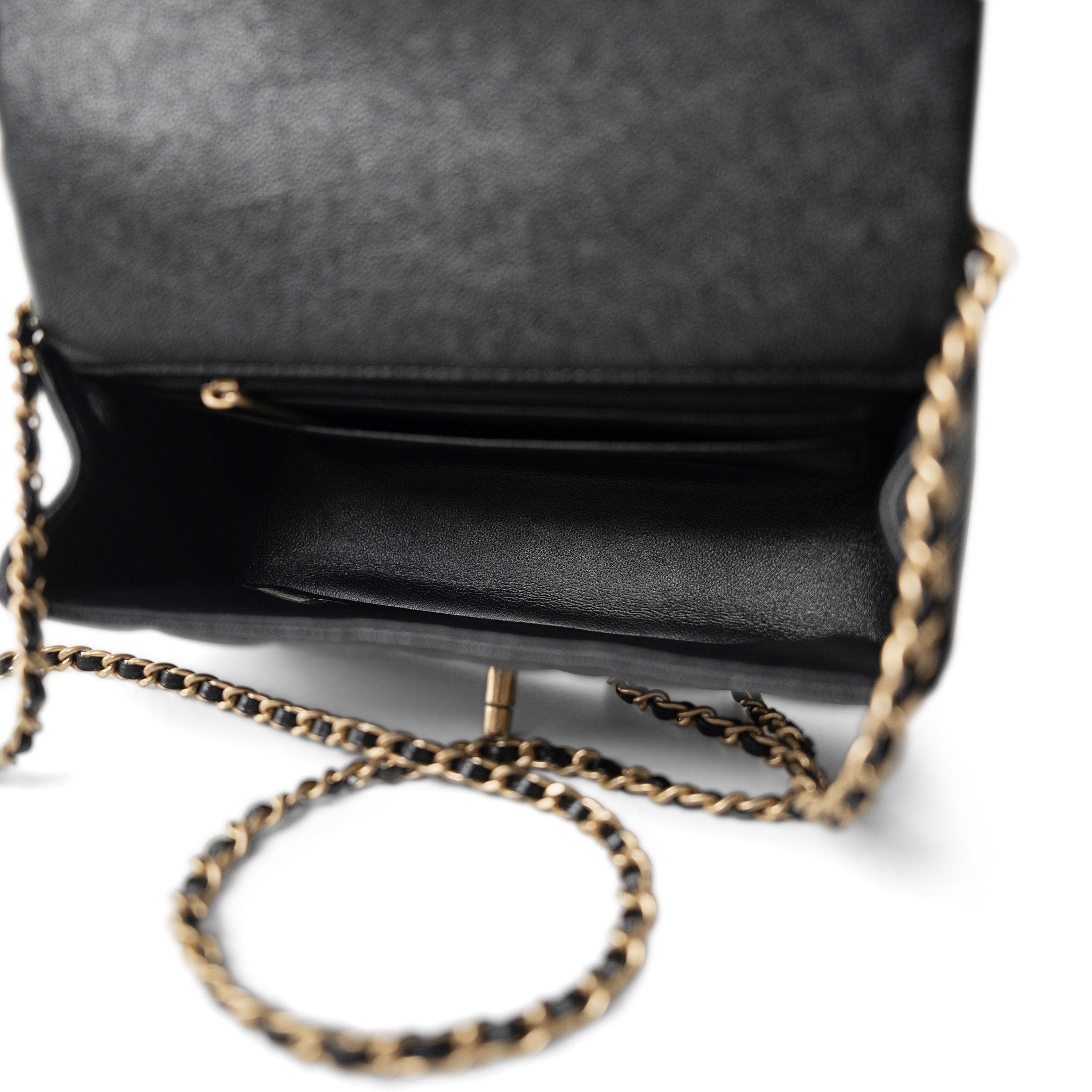 CHANEL Handbag Black Black Caviar Quilted Mini Top Handle Antique Gold Hardware - Redeluxe