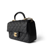 CHANEL Handbag Black Black Caviar Quilted Mini Top Handle Antique Gold Hardware - Redeluxe