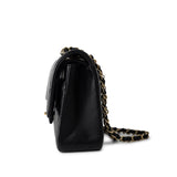 CHANEL Handbag Black Black Lambskin Quilted Classic Flap Medium Light Gold Hardware - Redeluxe