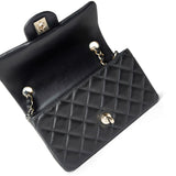 CHANEL Handbag Black Black Lambskin Quilted Mini Rectangular Flap Light Gold Hardware - Redeluxe