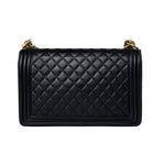 CHANEL Handbag Black Black Lambskin Quilted New Medium Boy Bag Aged Gold Hardware - Redeluxe
