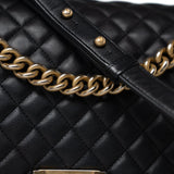 CHANEL Handbag Black Black Lambskin Quilted New Medium Boy Bag Aged Gold Hardware - Redeluxe