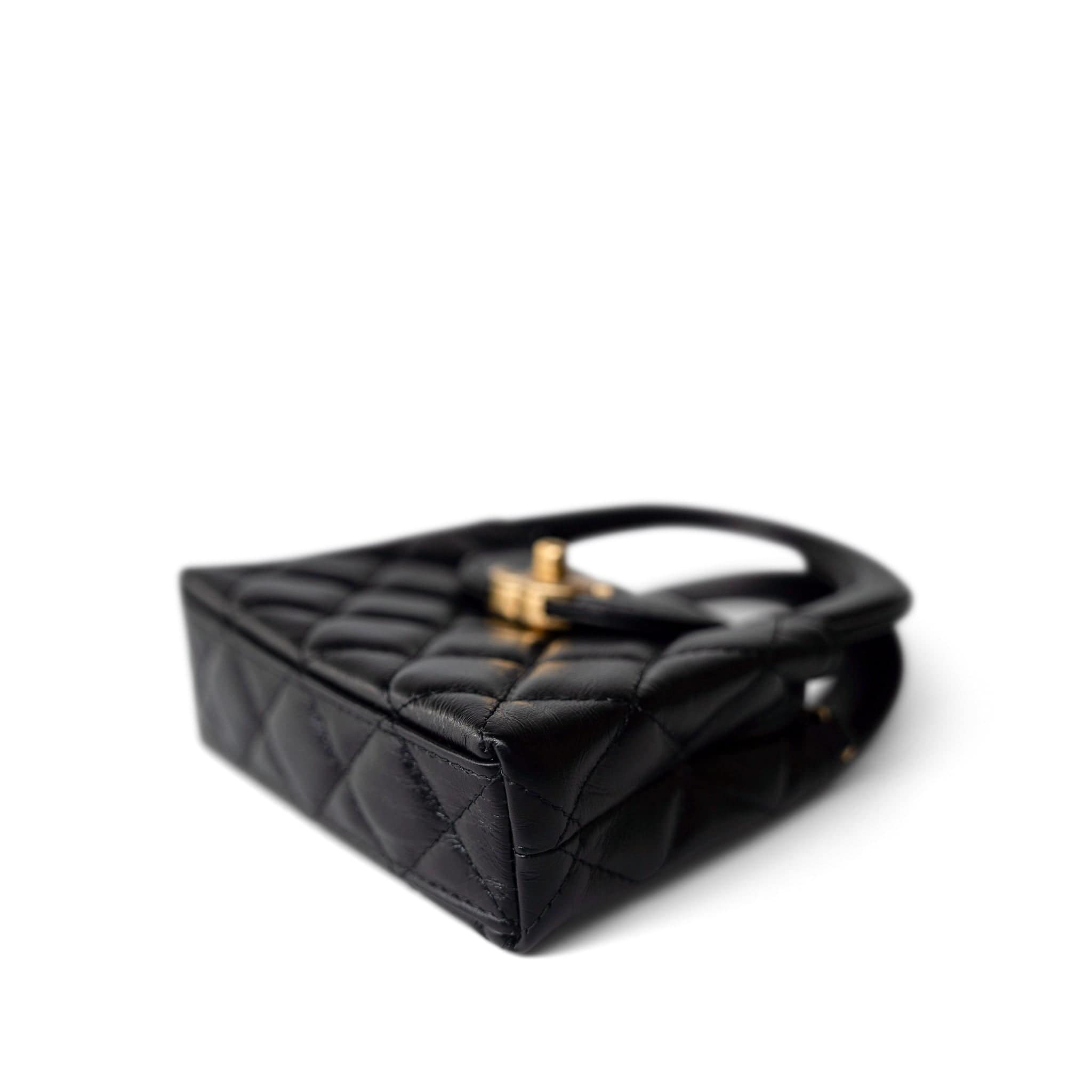 CHANEL Handbag Black Black Shiny Aged Calfskin Nano Kelly Mini Shopper - Redeluxe