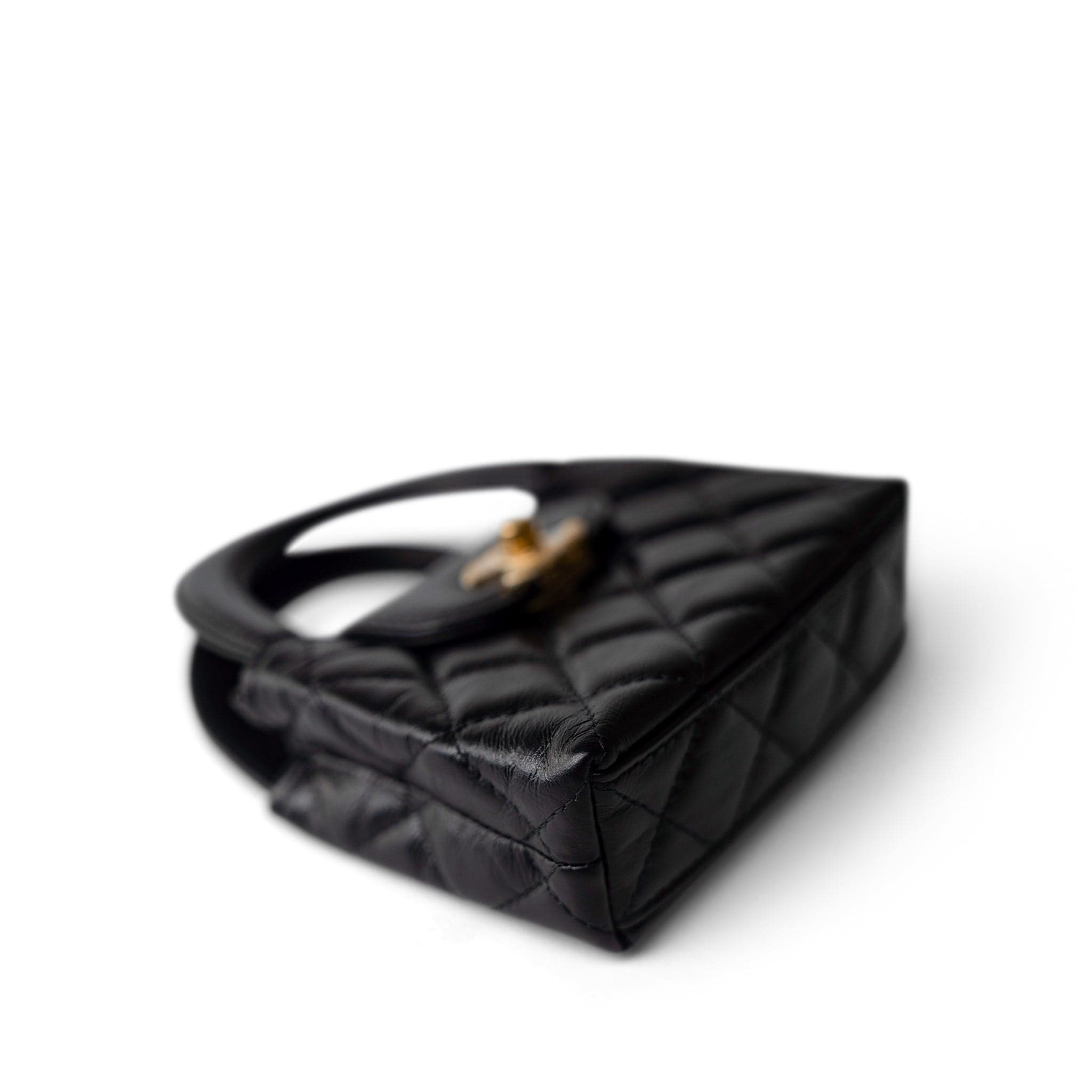 CHANEL Handbag Black Black Shiny Aged Calfskin Nano Kelly Mini Shopper - Redeluxe