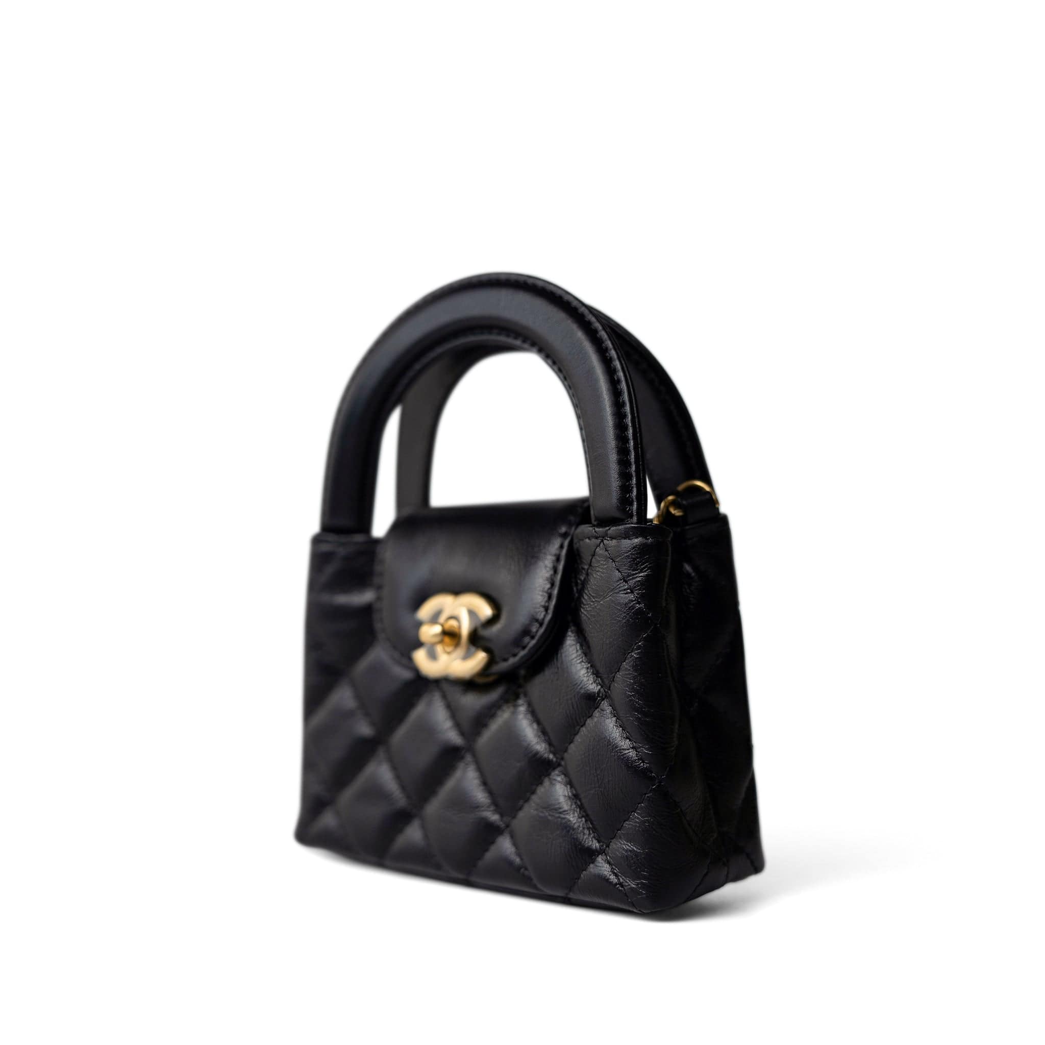 CHANEL Handbag Black Black Shiny Aged Calfskin Nano Kelly Mini Shopper - Redeluxe