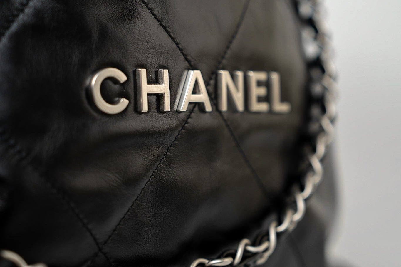 CHANEL Handbag Black Calfskin Quilted 22 Bag Small Aged Silver Hardware - Redeluxe