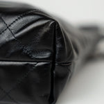 CHANEL Handbag Black Calfskin Quilted Drawstring 22 Bag Small Antique Silver Hardware - Redeluxe