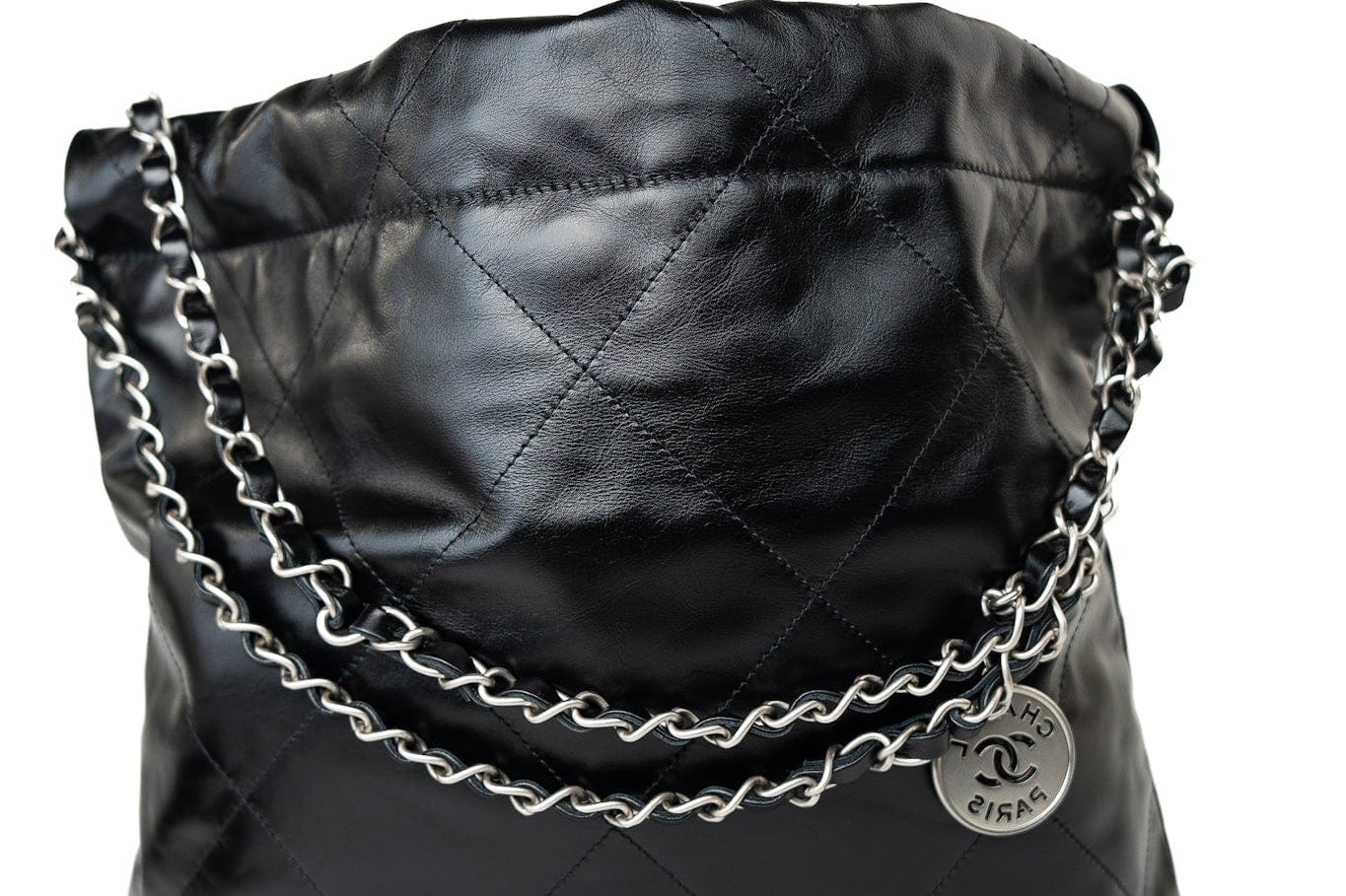 CHANEL Handbag Black Calfskin Quilted Drawstring 22 Bag Small Antique Silver Hardware - Redeluxe