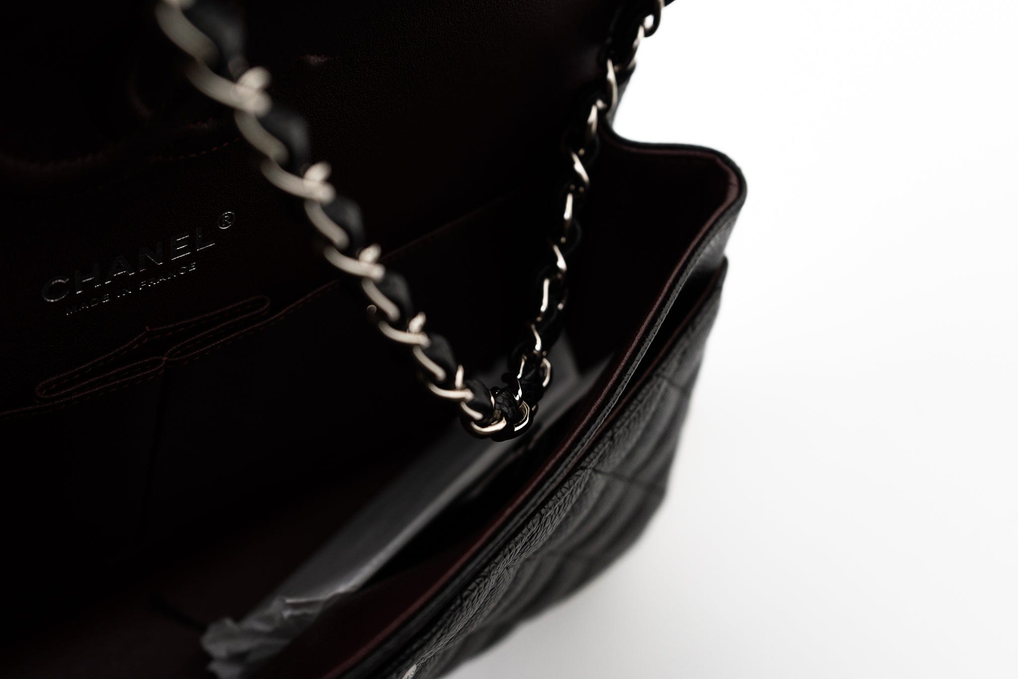 CHANEL Handbag Black Caviar Quilted Classic Flap Medium Silver Hardware - Redeluxe