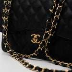 CHANEL Handbag Black Caviar Quilted Jumbo Classic Flap GHW - Redeluxe