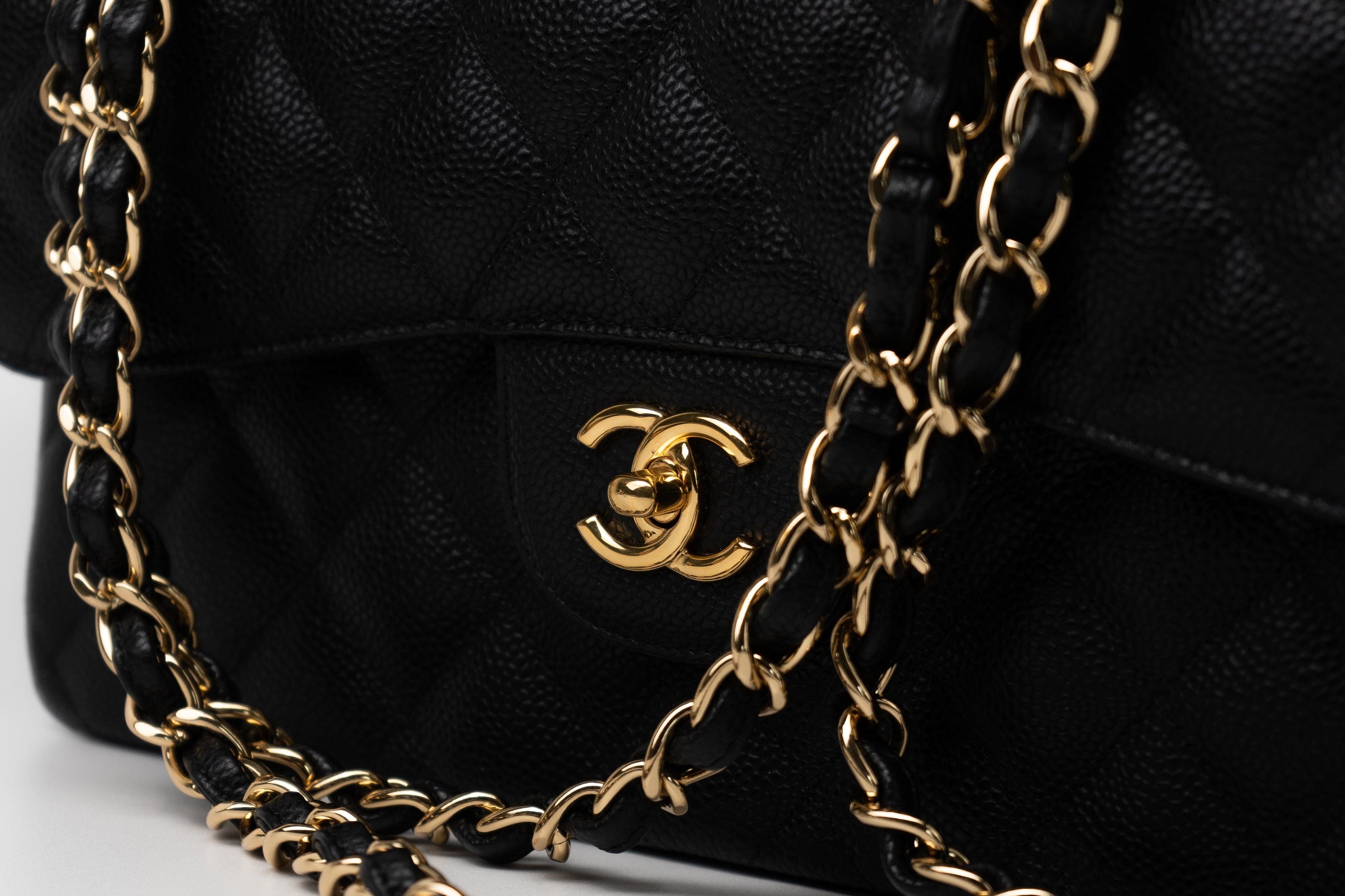 CHANEL Handbag Black Caviar Quilted Jumbo Classic Flap GHW - Redeluxe