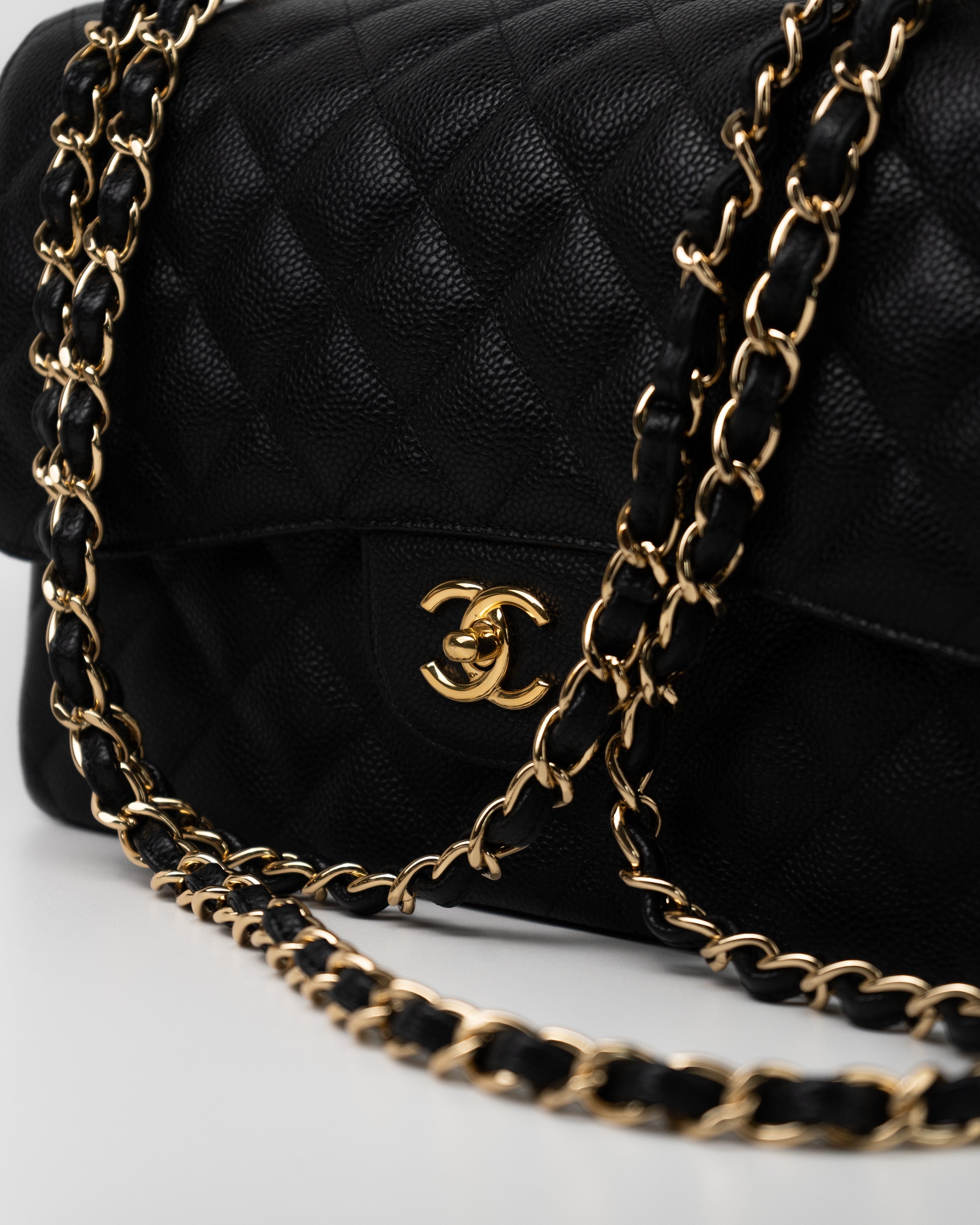 CHANEL Handbag Black Caviar Quilted Jumbo Classic Flap GHW - Redeluxe