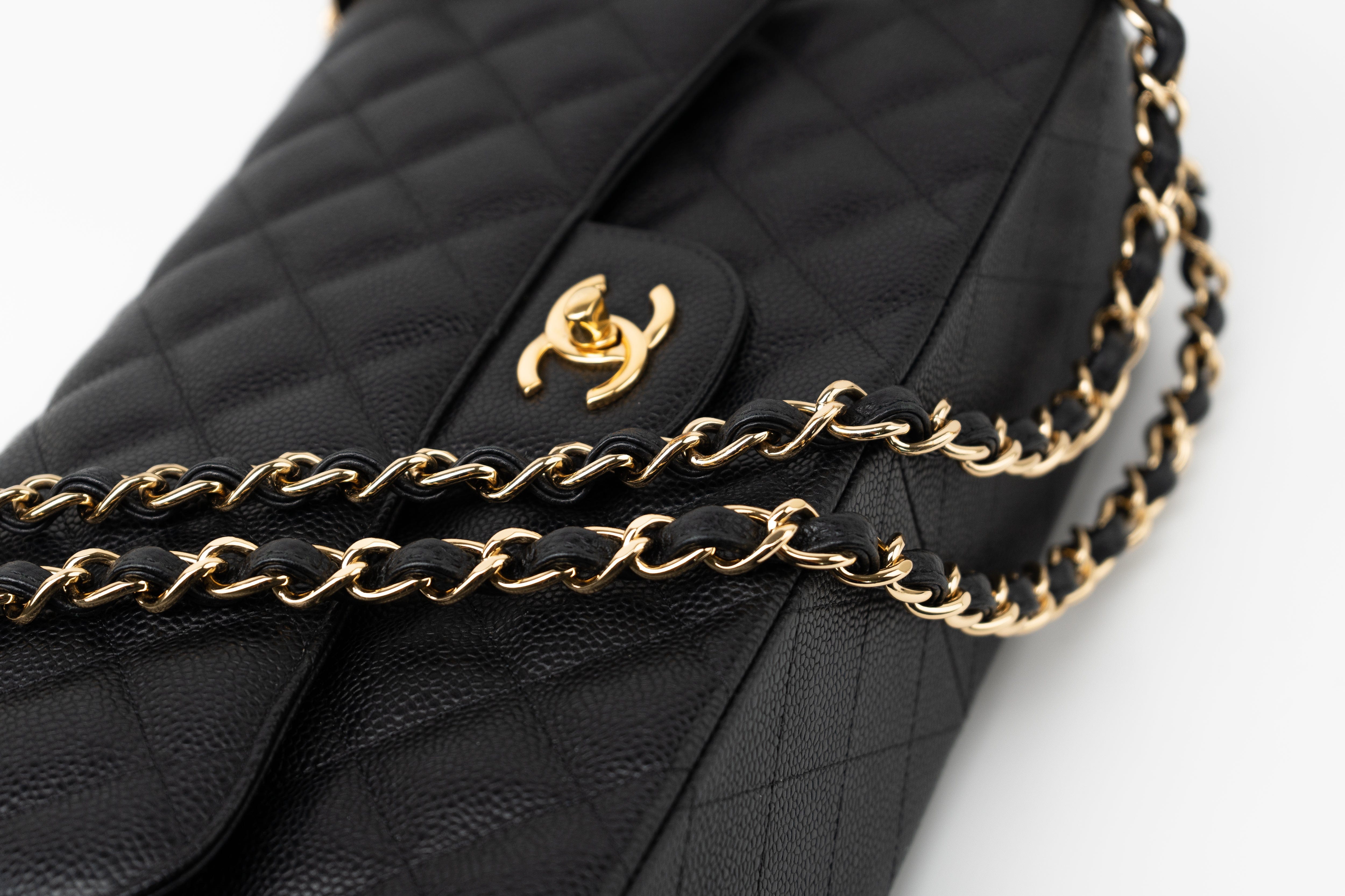 CHANEL Handbag Black Caviar Quilted Jumbo Classic Flap GHW - Redeluxe