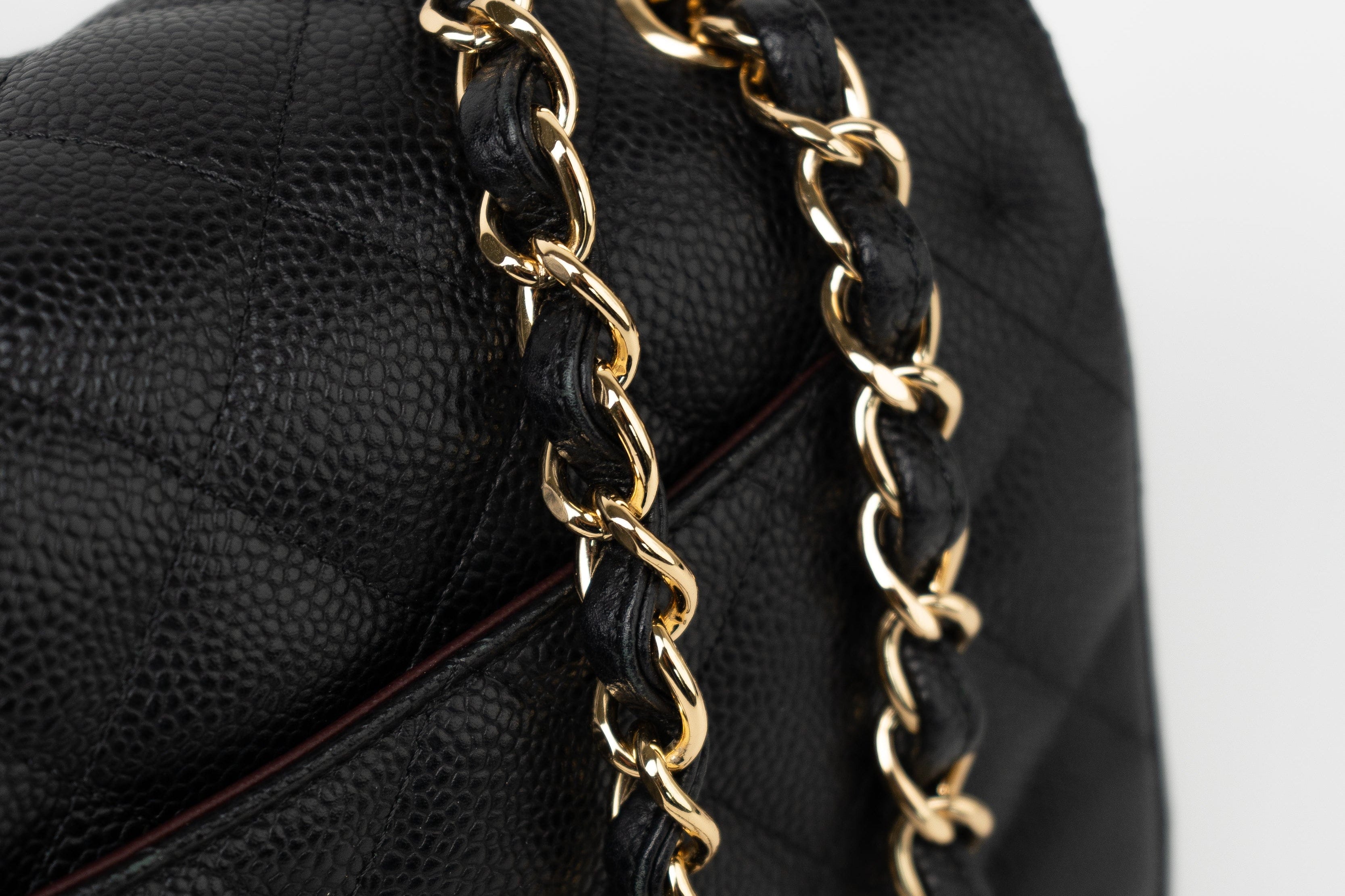 CHANEL Handbag Black Caviar Quilted Jumbo Classic Flap GHW - Redeluxe