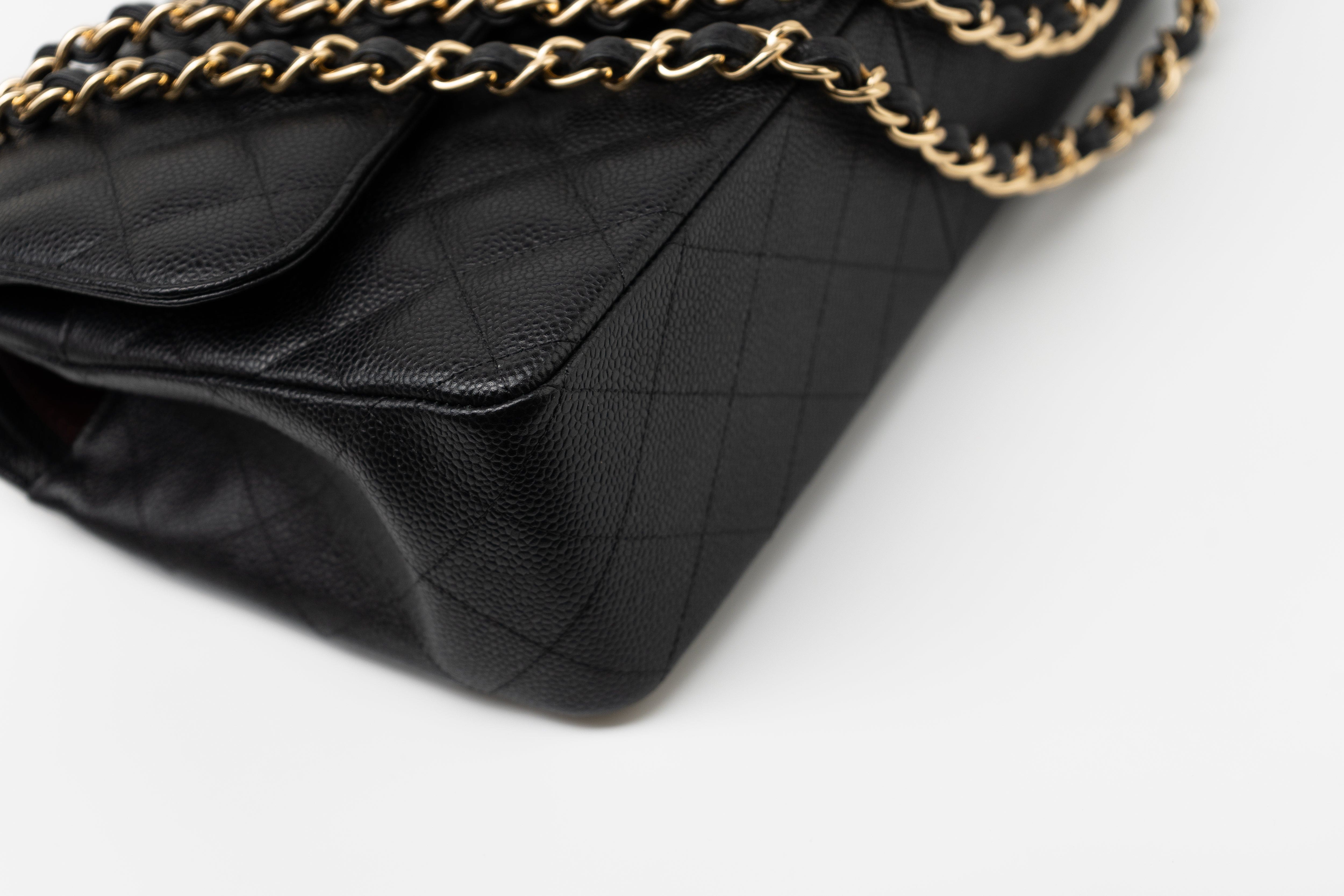 CHANEL Handbag Black Caviar Quilted Jumbo Classic Flap GHW - Redeluxe