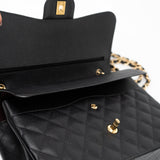 CHANEL Handbag Black Caviar Quilted Jumbo Classic Flap GHW - Redeluxe