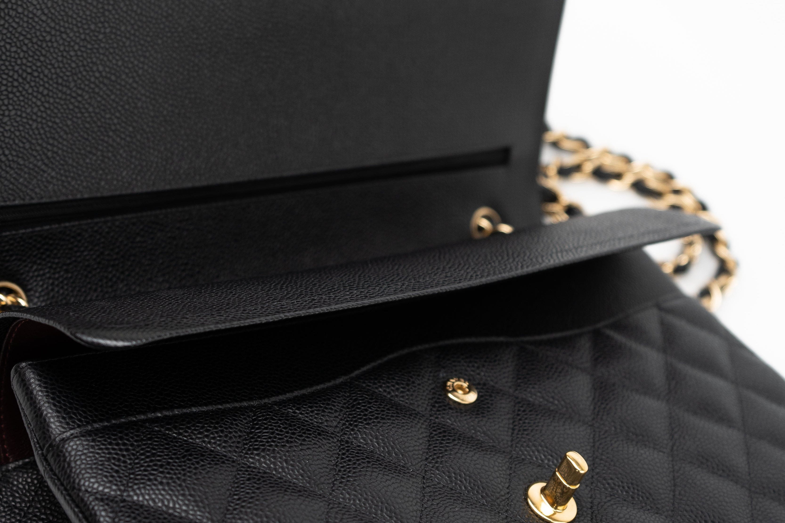 CHANEL Handbag Black Caviar Quilted Jumbo Classic Flap GHW - Redeluxe