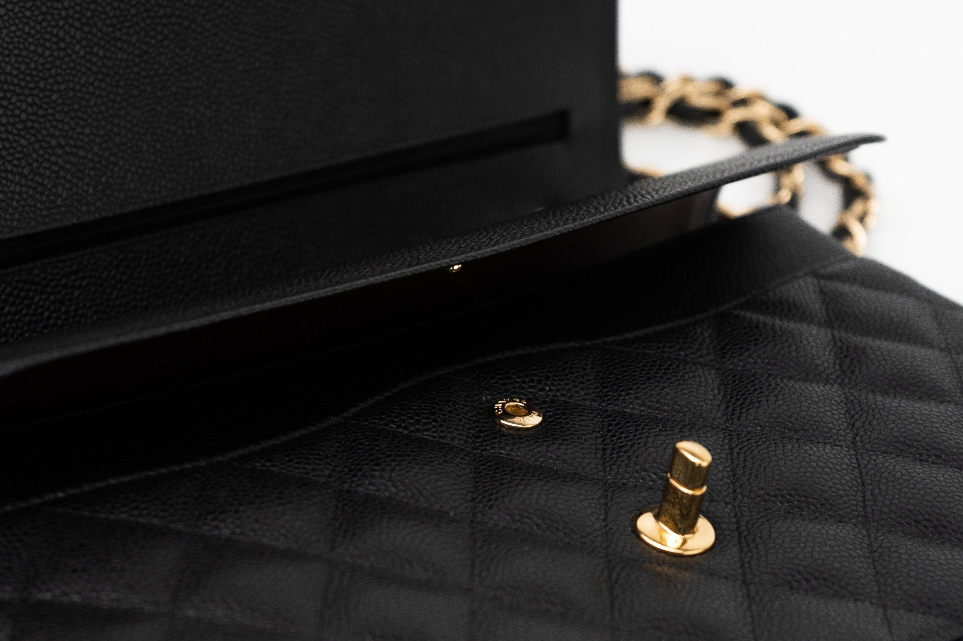 CHANEL Handbag Black Caviar Quilted Jumbo Classic Flap GHW - Redeluxe