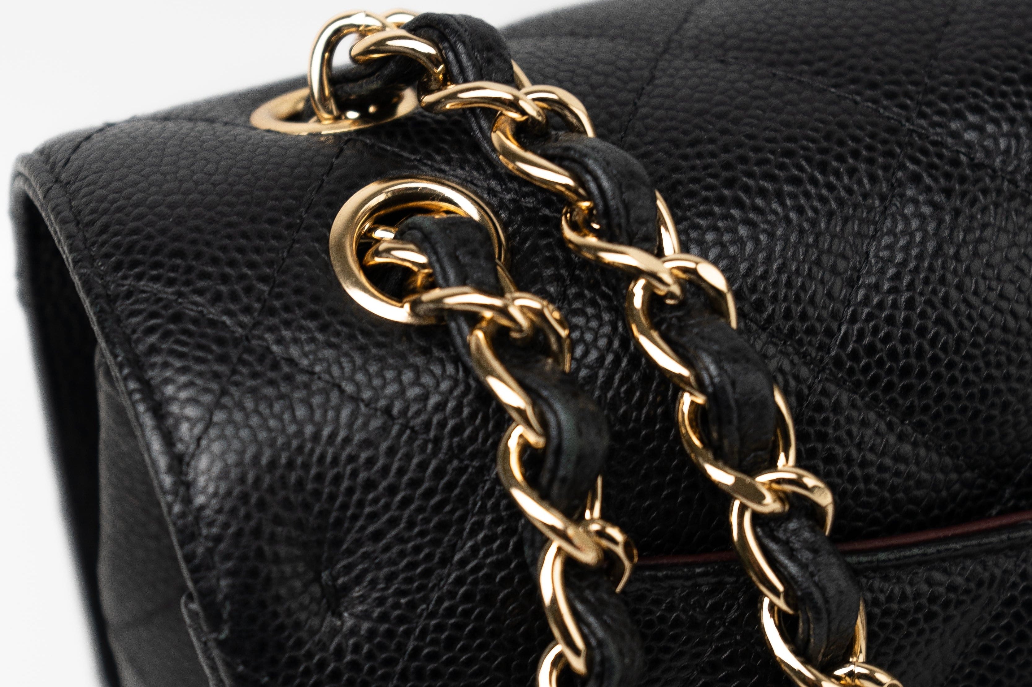 CHANEL Handbag Black Caviar Quilted Jumbo Classic Flap GHW - Redeluxe