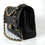 CHANEL Handbag Black Caviar Quilted Jumbo Classic Flap Gold Hardware - Redeluxe