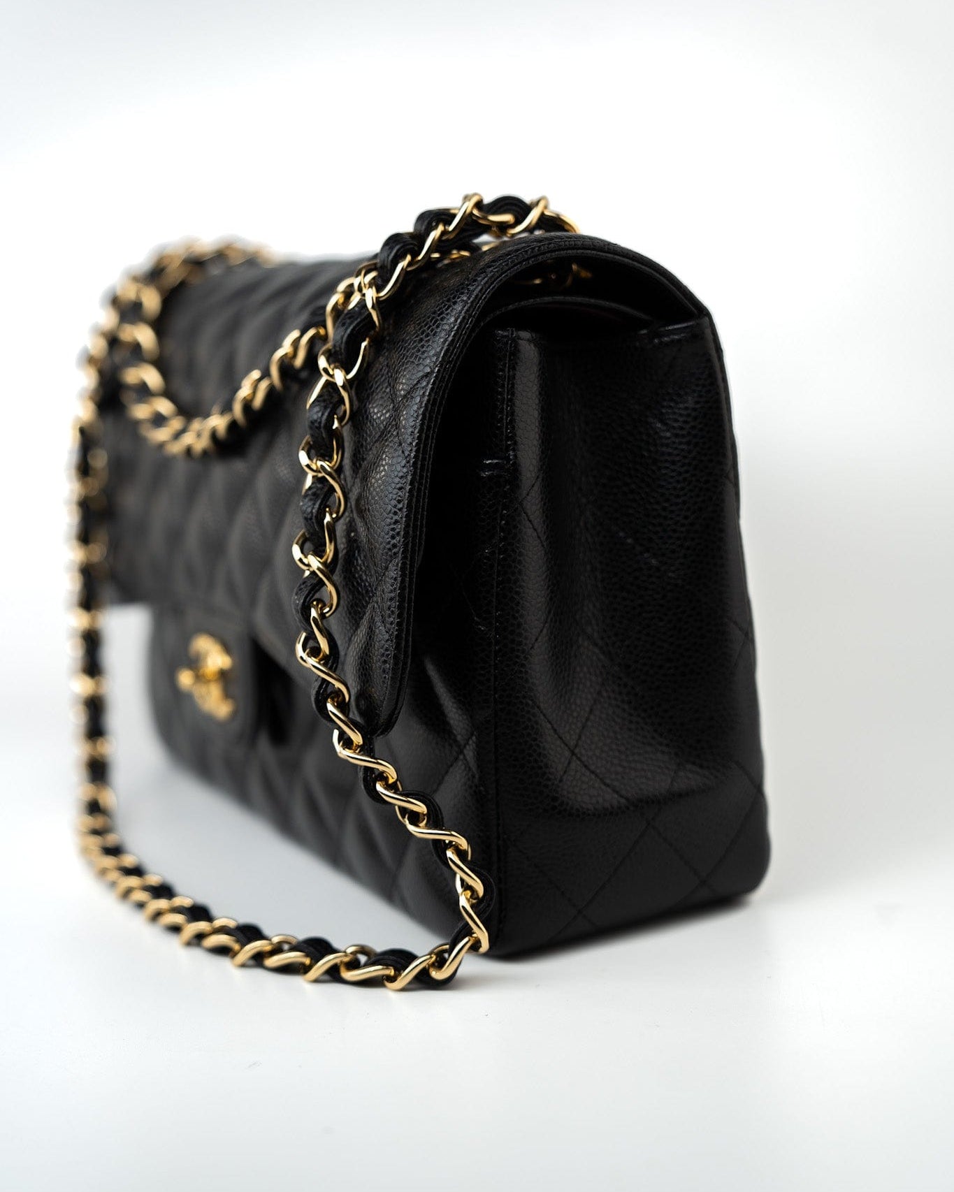 CHANEL Handbag Black Caviar Quilted Jumbo Classic Flap Gold Hardware - Redeluxe
