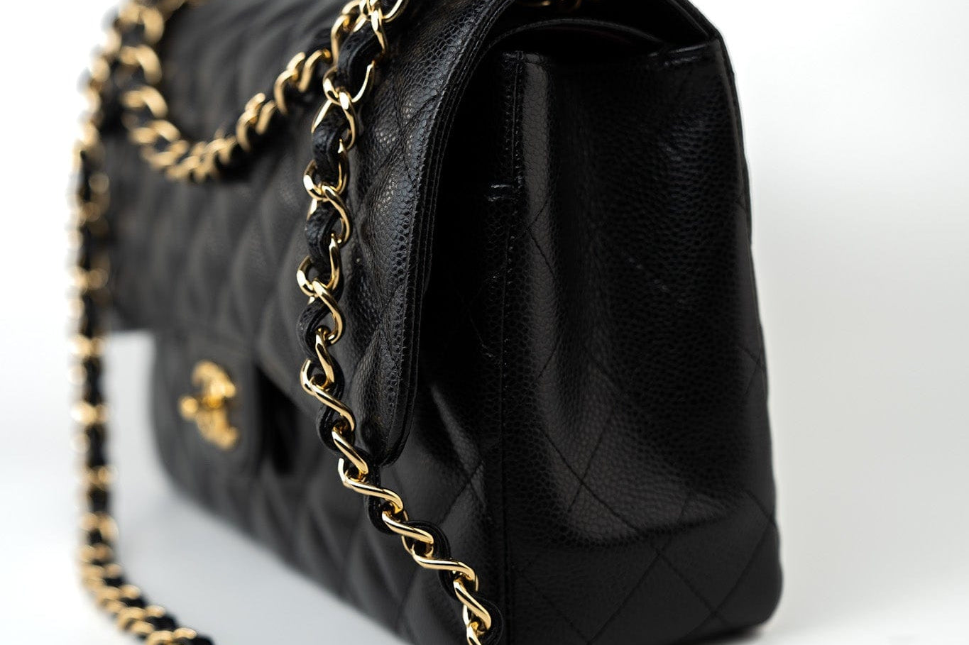 CHANEL Handbag Black Caviar Quilted Jumbo Classic Flap Gold Hardware - Redeluxe