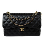 CHANEL Handbag Black Caviar Quilted Jumbo Classic Flap Gold Hardware - Redeluxe