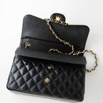 CHANEL Handbag Black Caviar Quilted Jumbo Classic Flap Gold Hardware - Redeluxe