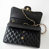 CHANEL Handbag Black Caviar Quilted Jumbo Classic Flap Gold Hardware - Redeluxe